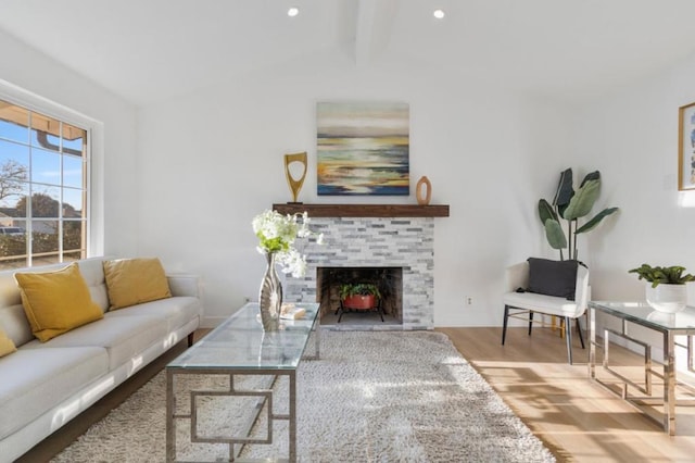 living room with lofted ceiling with beams and wood-type flooring