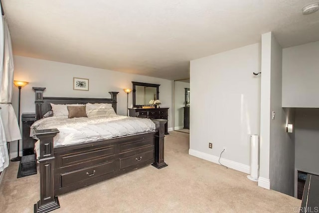 bedroom with light colored carpet