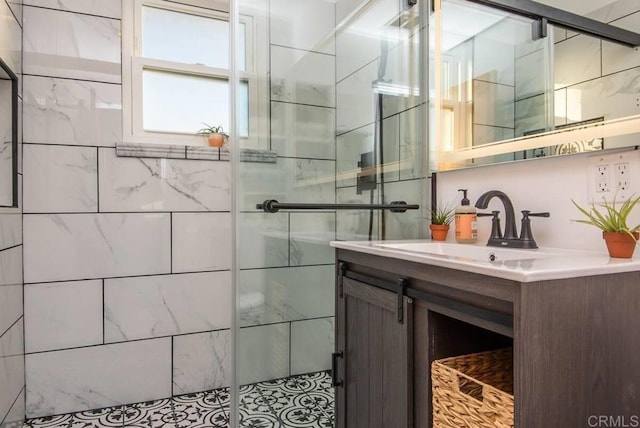 bathroom with vanity and walk in shower