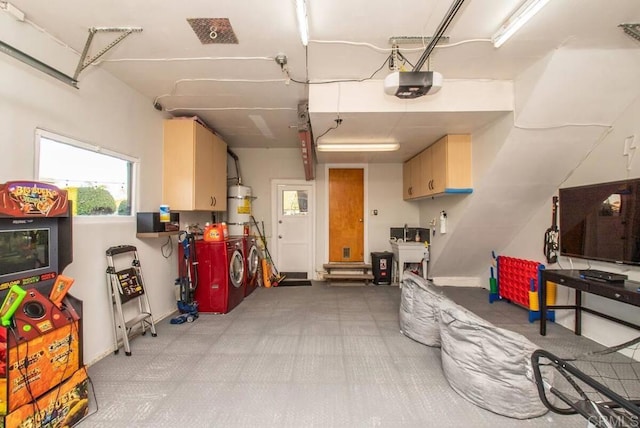 garage featuring a garage door opener and water heater