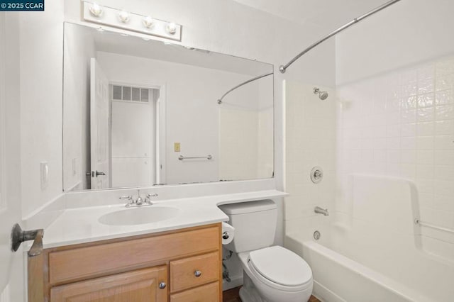 full bathroom with shower / bathtub combination, vanity, and toilet