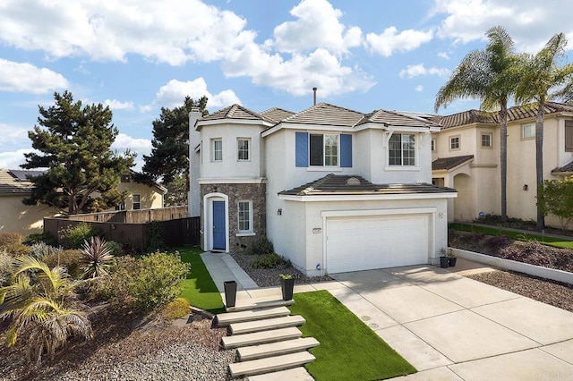 mediterranean / spanish-style home featuring a garage