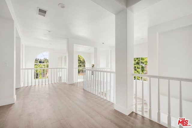 hallway featuring hardwood / wood-style floors