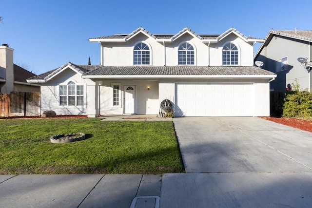 front of property featuring a garage and a front lawn