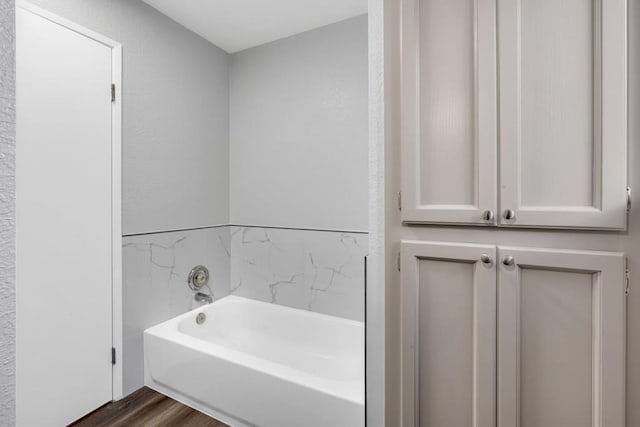 bathroom featuring a bathtub and hardwood / wood-style floors