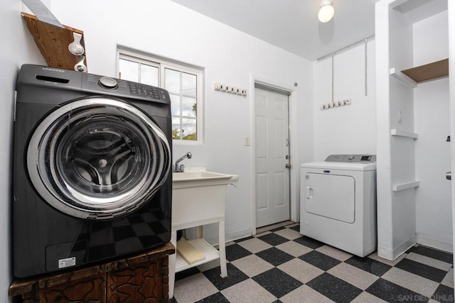 laundry room with washer and dryer