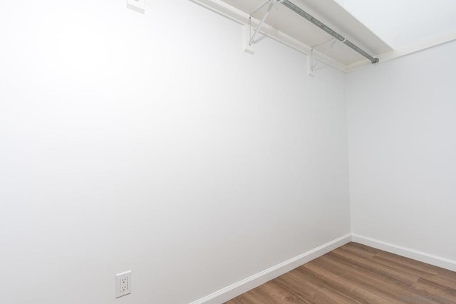 walk in closet featuring hardwood / wood-style floors