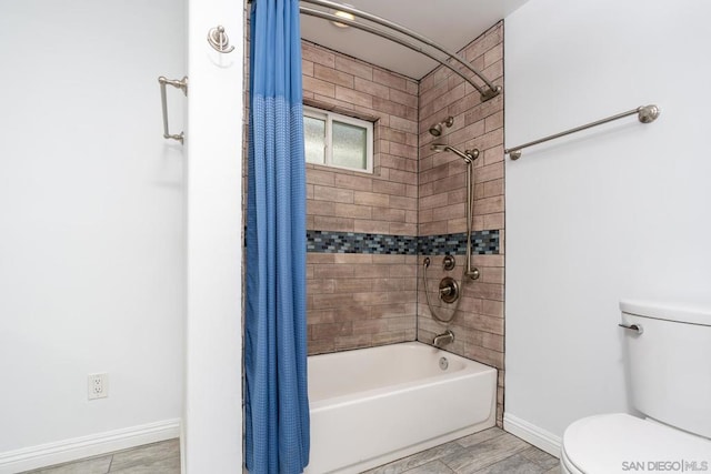 bathroom featuring toilet and shower / bath combo