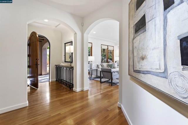 hallway featuring wood-type flooring