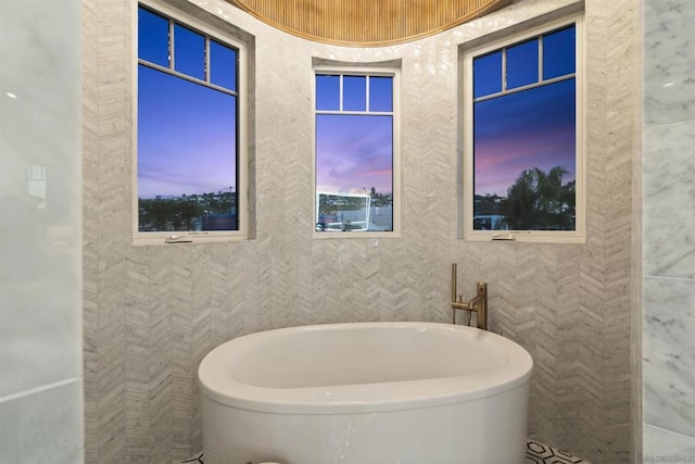 bathroom featuring a tub