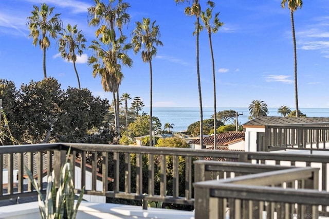 deck featuring a water view