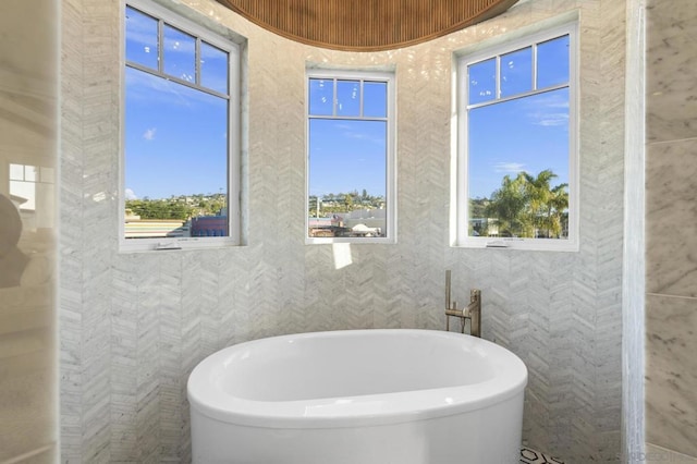 bathroom with a tub