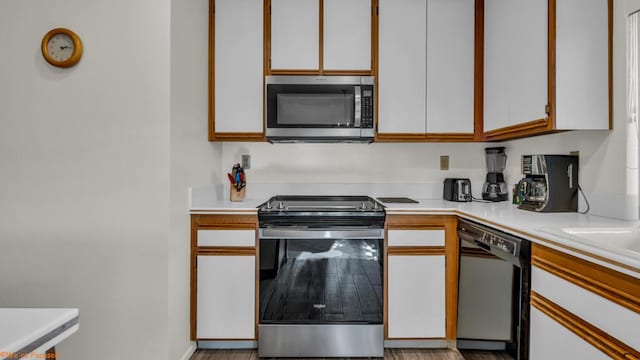 kitchen with white cabinetry and stainless steel appliances