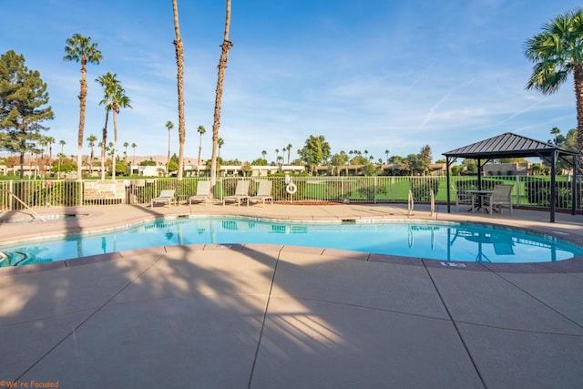 view of pool with a gazebo and a patio