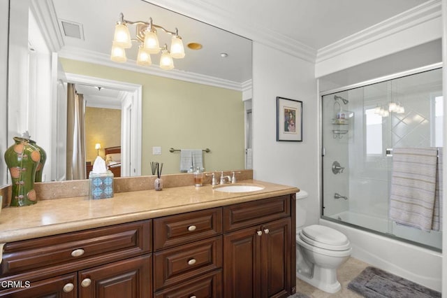 full bathroom featuring tile patterned floors, toilet, combined bath / shower with glass door, crown molding, and vanity