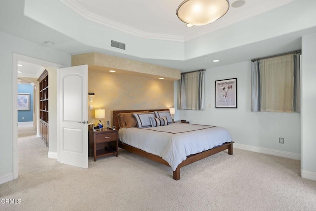 bedroom featuring crown molding and light colored carpet