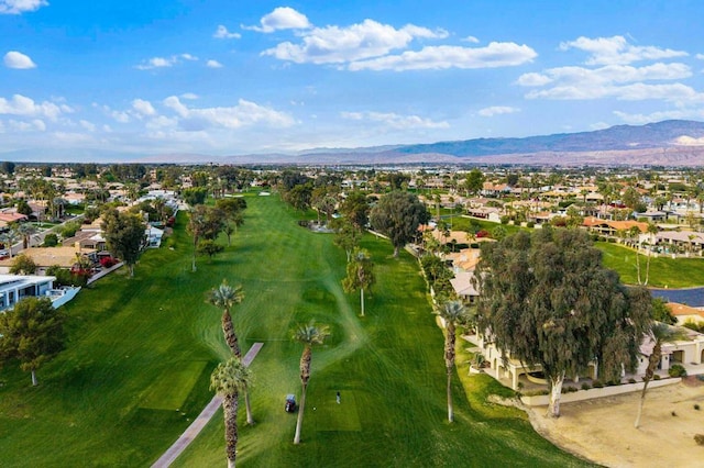 birds eye view of property featuring a mountain view