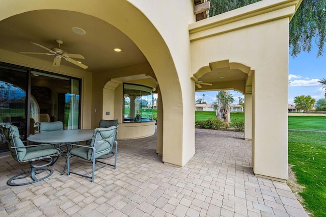 view of patio / terrace featuring ceiling fan