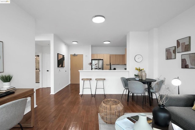 living room featuring dark hardwood / wood-style floors