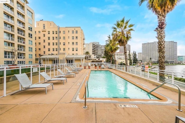 view of pool featuring a patio area