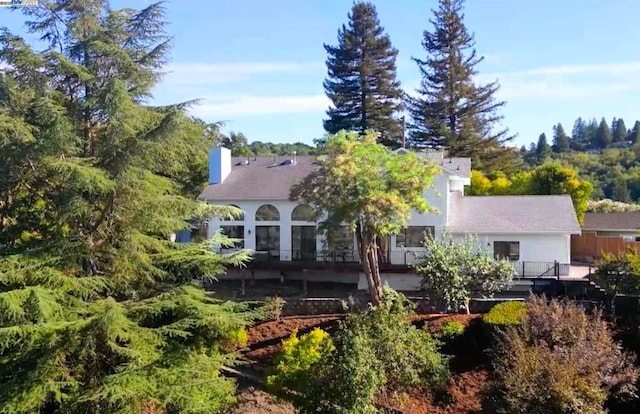 back of property featuring a sunroom