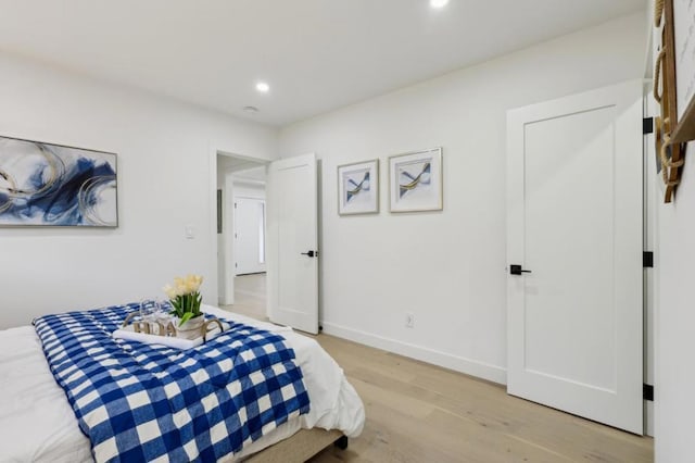 bedroom featuring light wood-type flooring