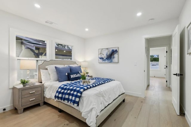 bedroom featuring light hardwood / wood-style floors