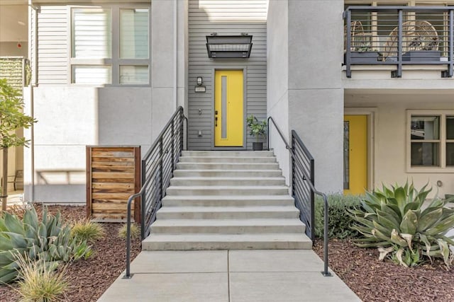 property entrance with a balcony