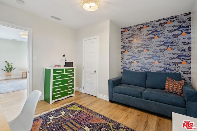 living room with wood-type flooring