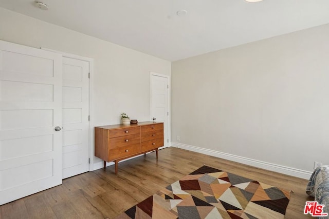 bedroom featuring light hardwood / wood-style floors