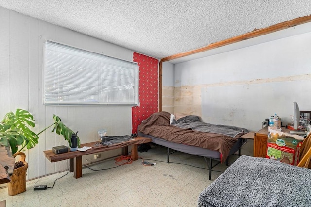 bedroom featuring a textured ceiling