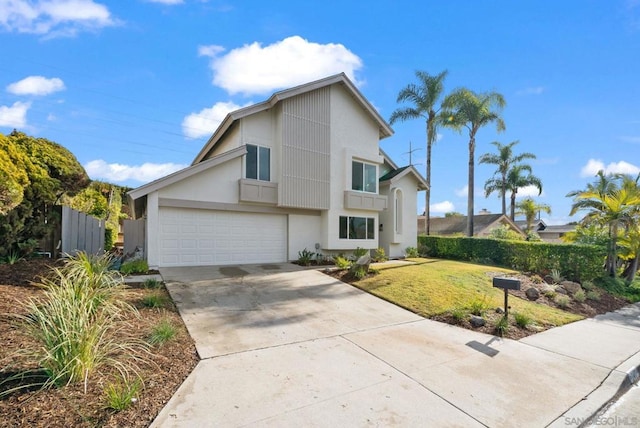 view of front property with a garage and a front lawn