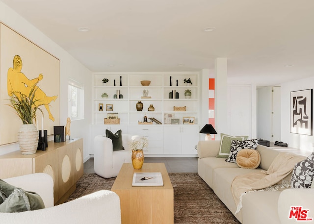 living room featuring dark tile patterned floors