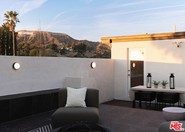 view of patio featuring a mountain view