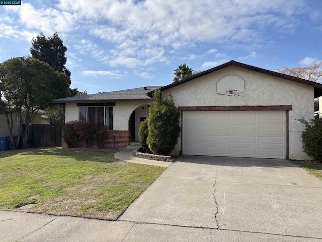 ranch-style home with a garage and a front lawn