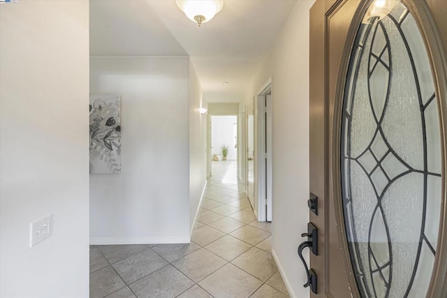 corridor featuring light tile patterned floors