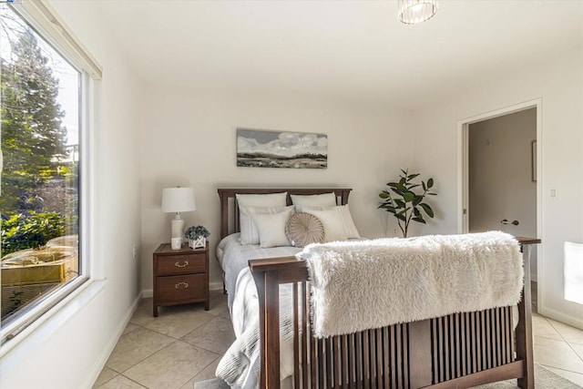 bedroom with light tile patterned flooring