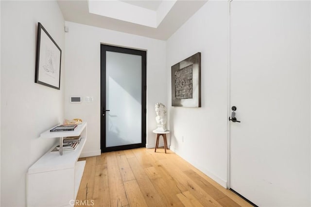 doorway to outside featuring light hardwood / wood-style flooring