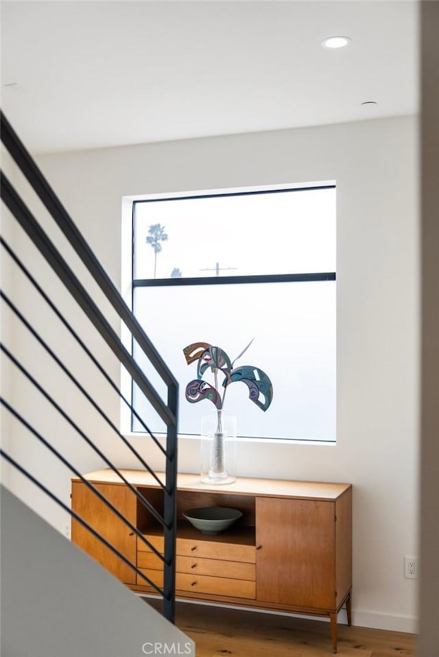 interior details featuring hardwood / wood-style flooring