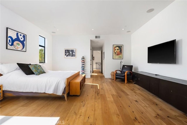 bedroom with light wood-type flooring