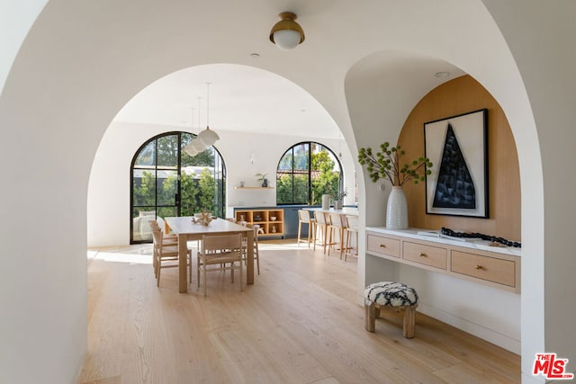 dining room with light hardwood / wood-style flooring