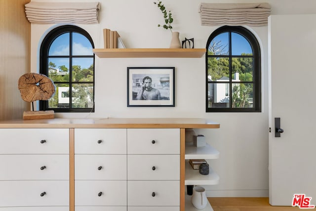 interior details with hardwood / wood-style flooring