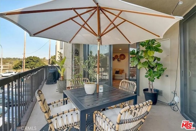 view of patio with a balcony