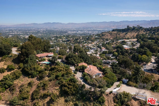 drone / aerial view featuring a mountain view