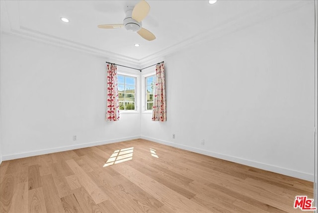 unfurnished room with ceiling fan and light wood-type flooring