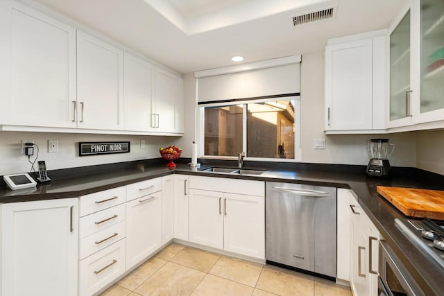 kitchen featuring white cabinetry, sink, stovetop, and dishwasher