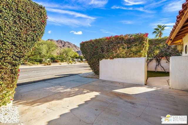 view of patio featuring a mountain view