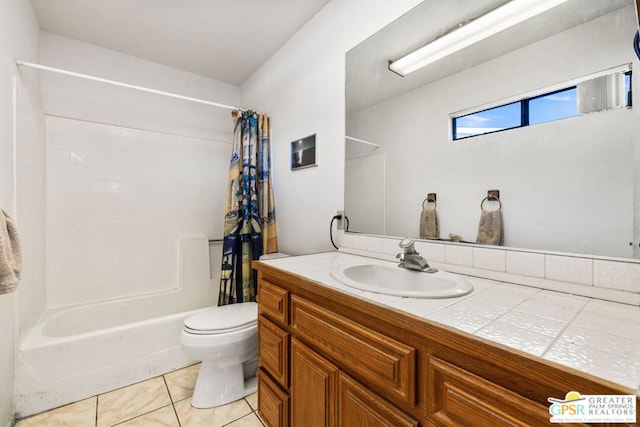 full bathroom with shower / bath combination with curtain, tile patterned floors, toilet, and vanity