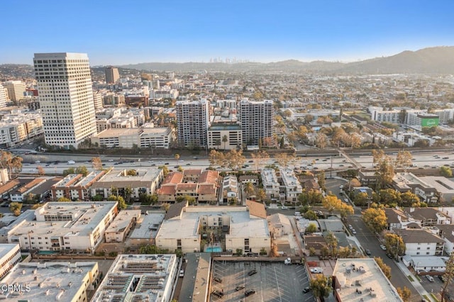 drone / aerial view featuring a mountain view