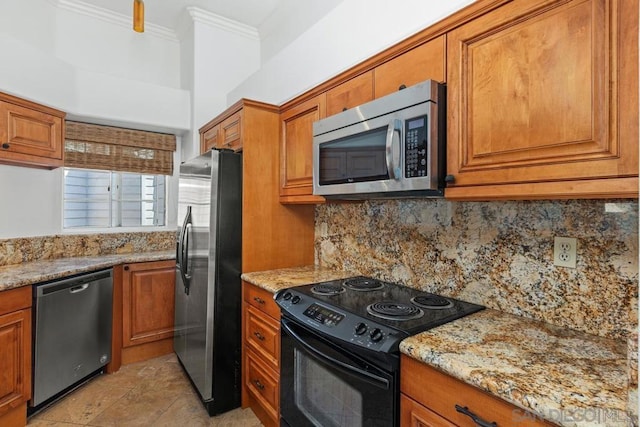 kitchen with tasteful backsplash, crown molding, appliances with stainless steel finishes, and light stone counters